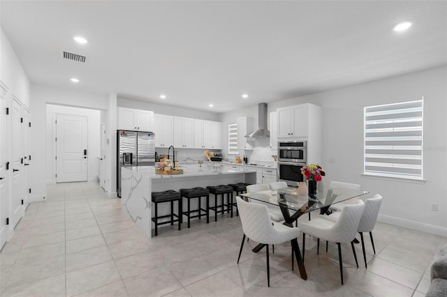 4911 Shady Pines Dr, Saint Cloud, FL 34772 - dining space featuring recessed lighting, baseboards, and light tile patterned floors