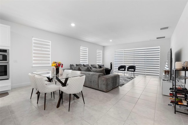 4911 Shady Pines Dr, Saint Cloud, FL 34772 - dining room with recessed lighting and light tile patterned flooring
