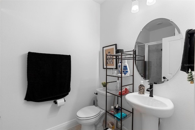 4911 Shady Pines Dr, Saint Cloud, FL 34772 - full bathroom featuring toilet, a shower stall, a sink, and baseboards