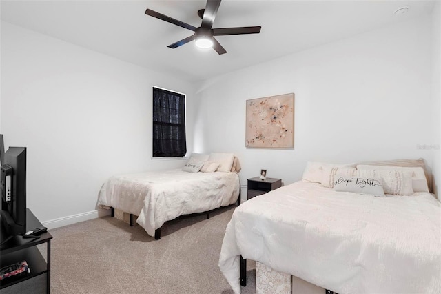 4911 Shady Pines Dr, Saint Cloud, FL 34772 - bedroom with carpet floors, baseboards, and ceiling fan