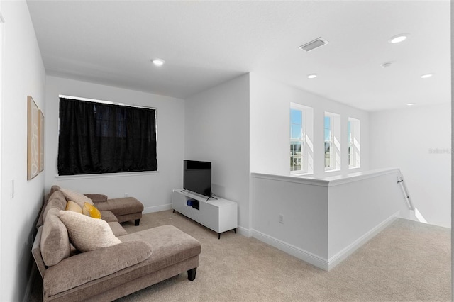 4911 Shady Pines Dr, Saint Cloud, FL 34772 - living room featuring light colored carpet, baseboards, and recessed lighting