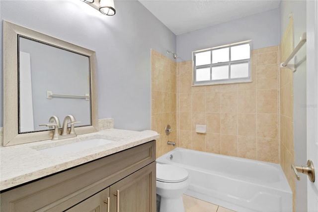 2007 Royal Bay Blvd Unit 144, Kissimmee, FL 34746 - bathroom featuring toilet, vanity, and shower / bathtub combination
