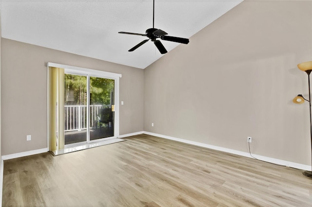 2007 Royal Bay Blvd Unit 144, Kissimmee, FL 34746 - empty room featuring baseboards, lofted ceiling, wood finished floors, and a ceiling fan