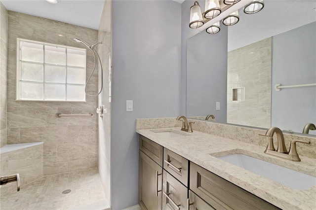 2007 Royal Bay Blvd Unit 144, Kissimmee, FL 34746 - bathroom featuring double vanity, a sink, and tiled shower