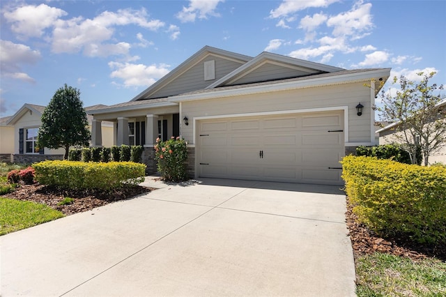 view of front of home featuring driveway and an attached garage