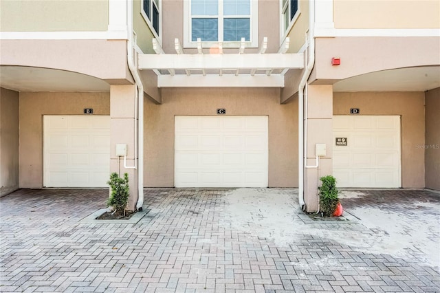 3384 Corona Village Way Unit 202, Orlando, FL 32835 - view of garage