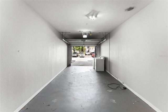 3384 Corona Village Way Unit 202, Orlando, FL 32835 - garage with baseboards