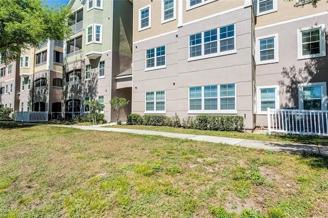 3384 Corona Village Way Unit 202, Orlando, FL 32835 - view of building exterior featuring fence