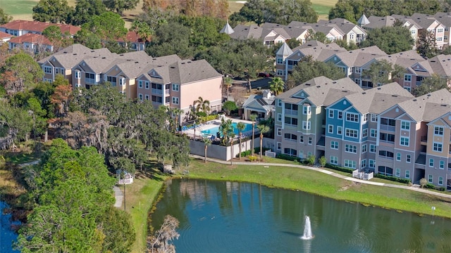 3384 Corona Village Way Unit 202, Orlando, FL 32835 - drone / aerial view featuring a water view and a residential view