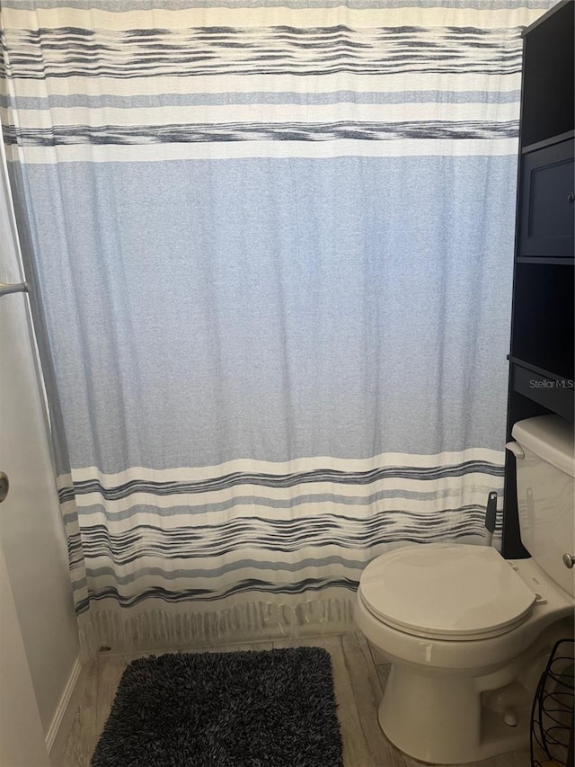 345 W Seminole Ave, Eustis, FL 32726 - full bathroom featuring toilet