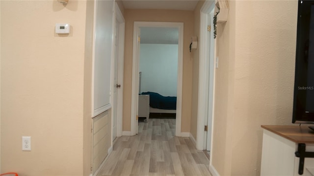 345 W Seminole Ave, Eustis, FL 32726 - hall featuring light wood-style flooring and baseboards