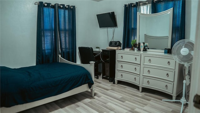 345 W Seminole Ave, Eustis, FL 32726 - bedroom featuring light wood-style floors