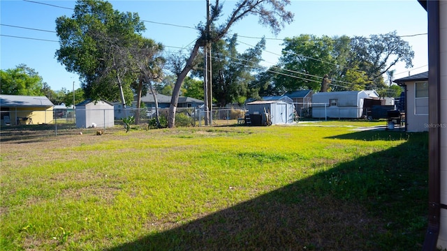 345 W Seminole Ave, Eustis, FL 32726 - view of yard featuring a storage shed and an outbuilding
