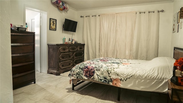 345 W Seminole Ave, Eustis, FL 32726 - bedroom featuring crown molding
