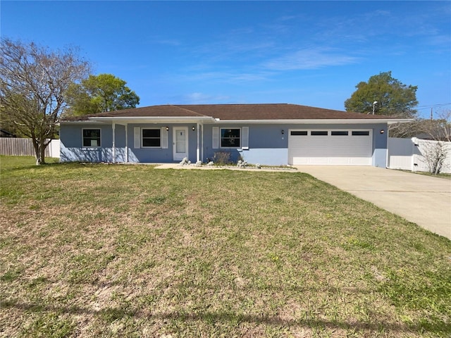 6 Almond Trce, Ocala, FL 34472 - single story home with a front lawn, fence, stucco siding, a garage, and driveway