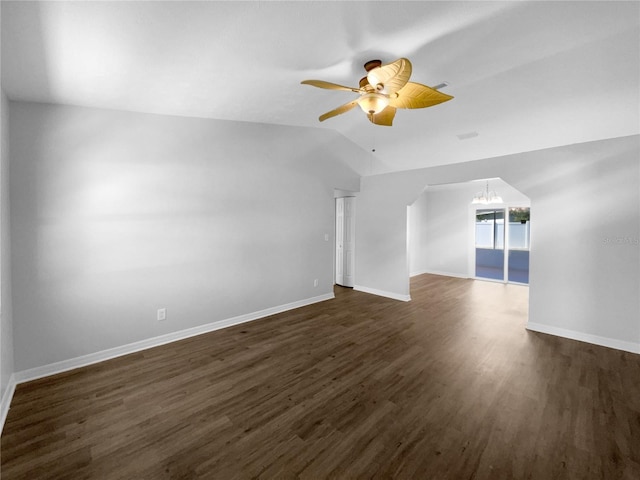 6 Almond Trce, Ocala, FL 34472 - interior space with dark wood-style floors, ceiling fan with notable chandelier, baseboards, and lofted ceiling