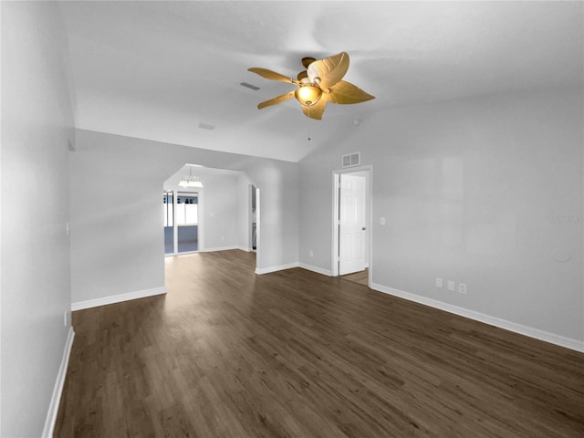 6 Almond Trce, Ocala, FL 34472 - empty room with visible vents, ceiling fan with notable chandelier, dark wood-style floors, baseboards, and lofted ceiling