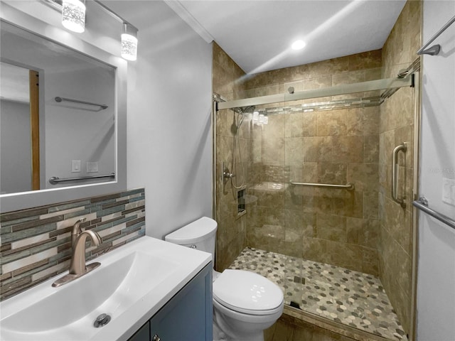 6 Almond Trce, Ocala, FL 34472 - bathroom with vanity, backsplash, a shower stall, and toilet