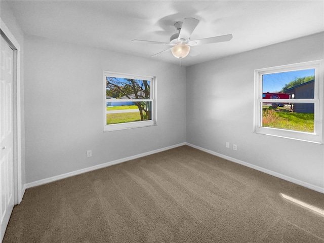 6 Almond Trce, Ocala, FL 34472 - carpeted spare room featuring baseboards, a wealth of natural light, and ceiling fan