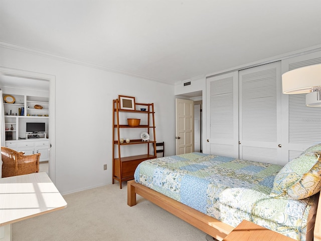 bedroom featuring light carpet, visible vents, a closet, and crown molding