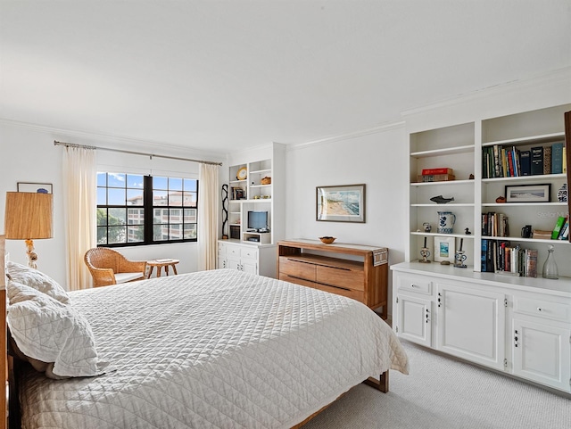 bedroom featuring crown molding and light carpet