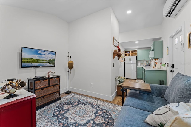 407 E Jersey St, Orlando, FL 32806 - living area with recessed lighting, light wood-type flooring, baseboards, and a wall mounted AC