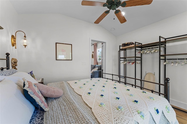 407 E Jersey St, Orlando, FL 32806 - bedroom with ceiling fan, wood finished floors, and vaulted ceiling