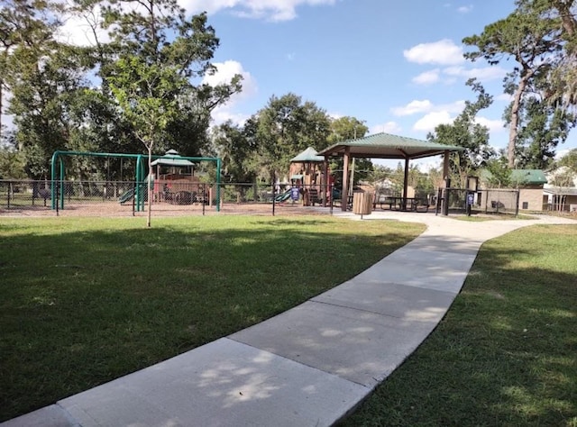 407 E Jersey St, Orlando, FL 32806 - community play area with a gazebo, a yard, and fence
