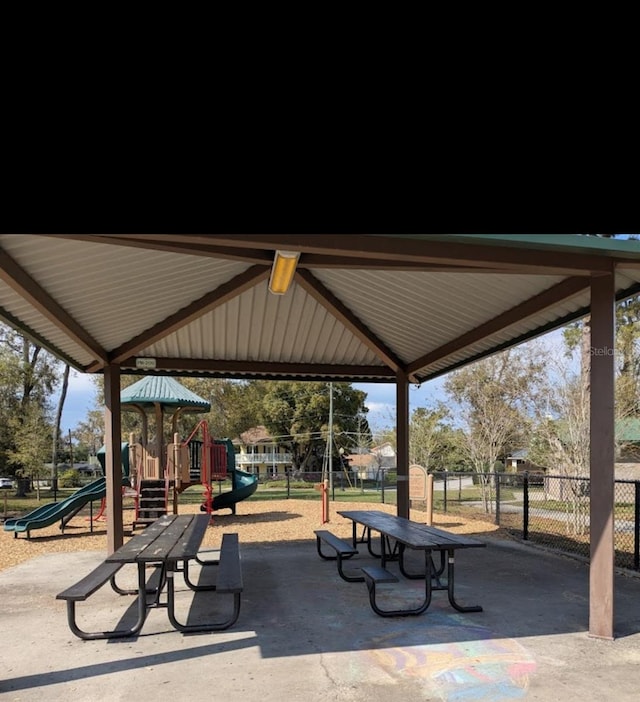 407 E Jersey St, Orlando, FL 32806 - view of community featuring fence and playground community