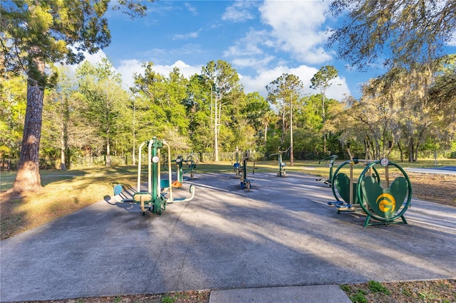 view of home's community featuring playground community