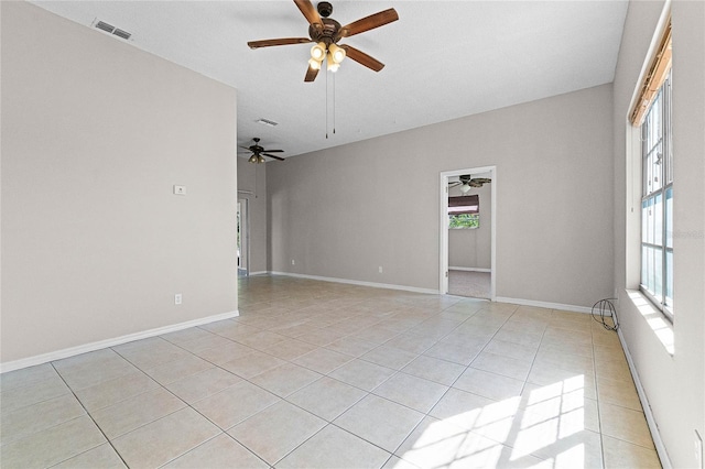 4751 Deer Run Rd, Saint Cloud, FL 34772 - unfurnished room with light tile patterned flooring, visible vents, baseboards, and a ceiling fan
