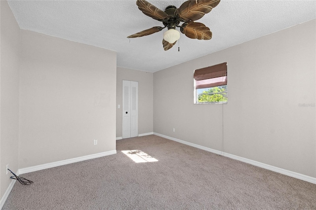 4751 Deer Run Rd, Saint Cloud, FL 34772 - unfurnished room featuring baseboards, carpet, ceiling fan, and a textured ceiling