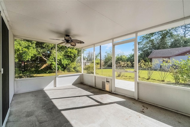 4751 Deer Run Rd, Saint Cloud, FL 34772 - unfurnished sunroom featuring a ceiling fan