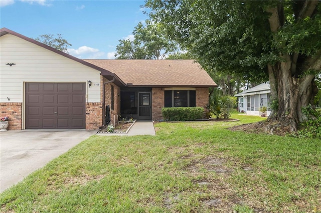1148 Monroe Ave, Saint Cloud, FL 34769 - single story home with brick siding, an attached garage, a front yard, driveway, and a shingled roof