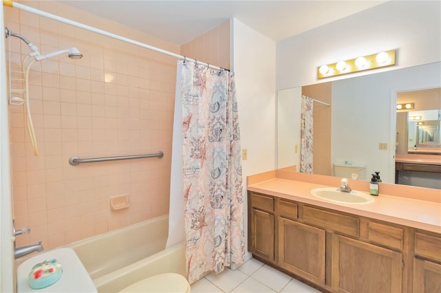 1148 Monroe Ave, Saint Cloud, FL 34769 - bathroom with toilet, vanity, tile patterned flooring, and shower / tub combo with curtain