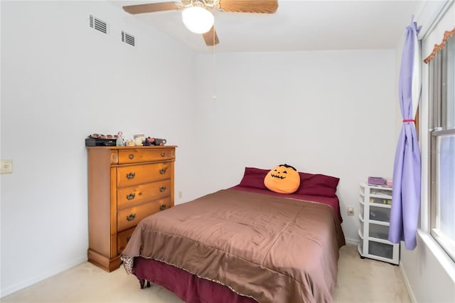 1148 Monroe Ave, Saint Cloud, FL 34769 - carpeted bedroom featuring baseboards and ceiling fan