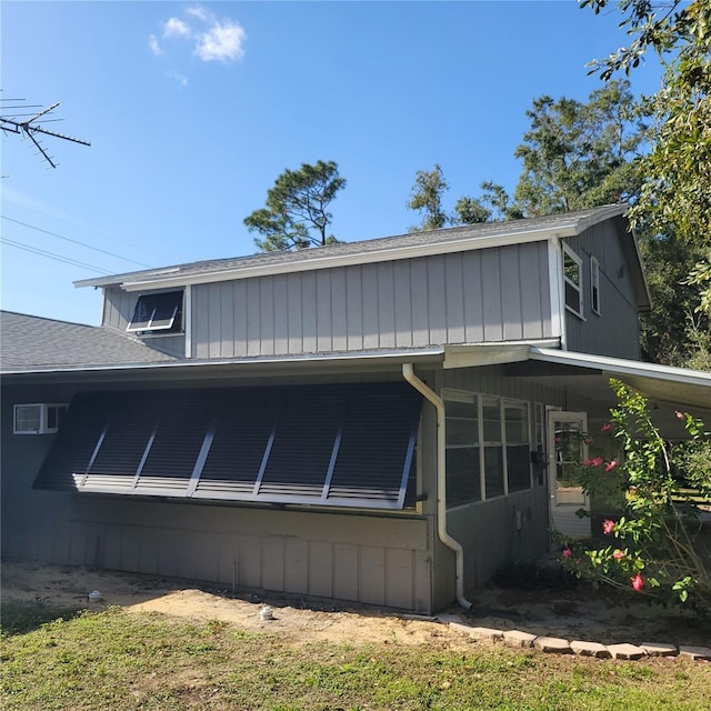1661 Votaw Rd, Apopka, FL 32703 - view of property exterior with a shingled roof