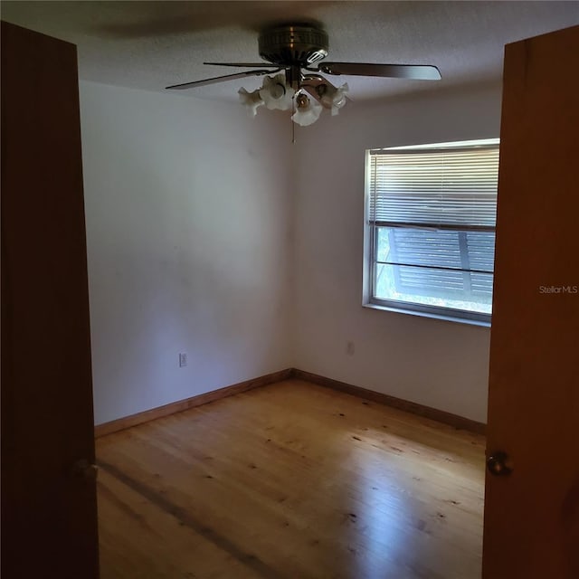 1661 Votaw Rd, Apopka, FL 32703 - empty room with baseboards, light wood finished floors, and ceiling fan