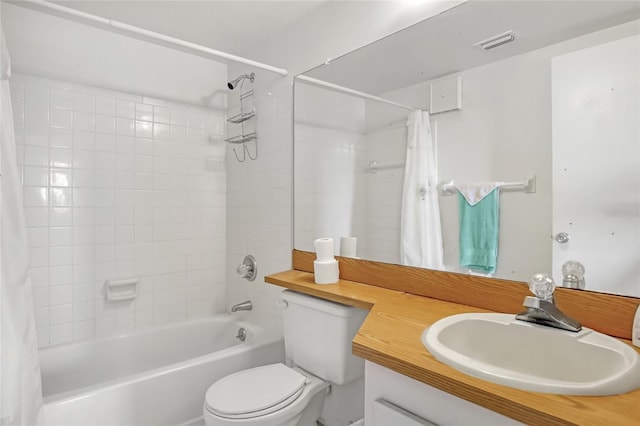 2465 S Washington Ave Unit A402, Titusville, FL 32780 - bathroom featuring visible vents, vanity, toilet, and shower / tub combo
