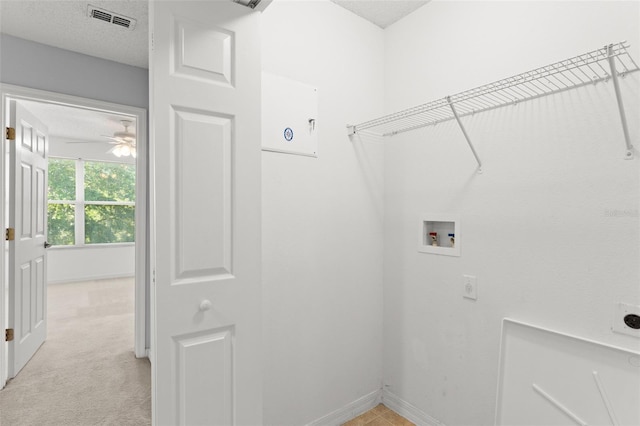 435 Tradition Ln, Winter Springs, FL 32708 - clothes washing area featuring light carpet, baseboards, visible vents, and electric dryer hookup