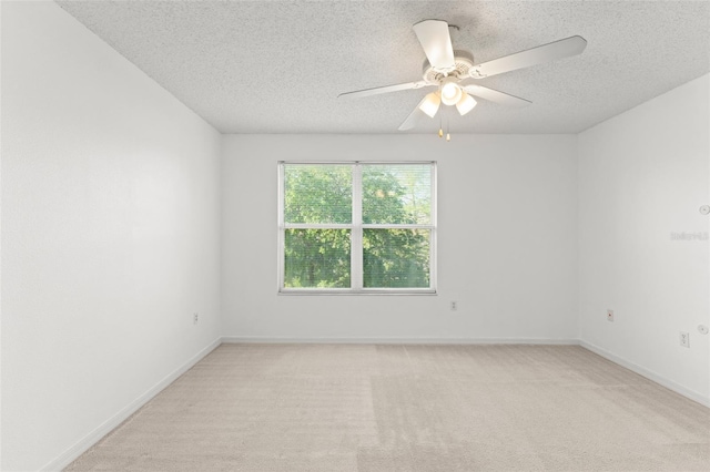 435 Tradition Ln, Winter Springs, FL 32708 - unfurnished room with a textured ceiling, ceiling fan, baseboards, and light colored carpet