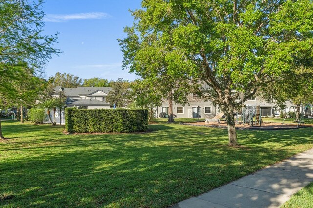 435 Tradition Ln, Winter Springs, FL 32708 - view of yard with playground community