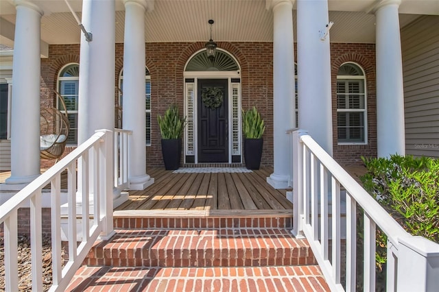 1570 Oakford Rd, Sarasota, FL 34240 - entrance to property with brick siding and covered porch