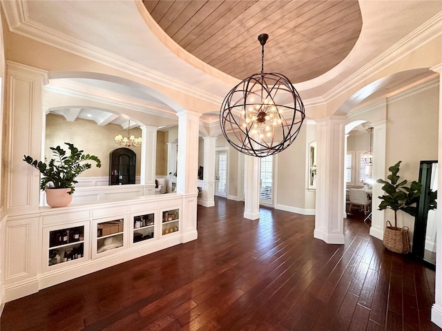 1570 Oakford Rd, Sarasota, FL 34240 - foyer entrance featuring a chandelier, decorative columns, arched walkways, and plenty of natural light