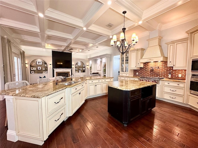 1570 Oakford Rd, Sarasota, FL 34240 - kitchen with a sink, a spacious island, a chandelier, dark wood finished floors, and beamed ceiling