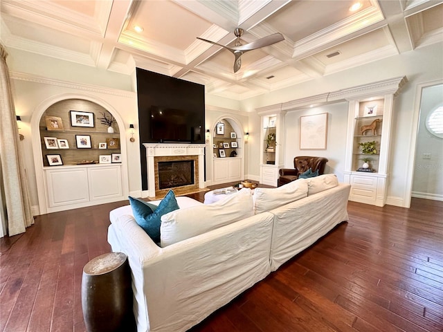 1570 Oakford Rd, Sarasota, FL 34240 - living room with dark wood finished floors, beam ceiling, a ceiling fan, a fireplace with flush hearth, and coffered ceiling