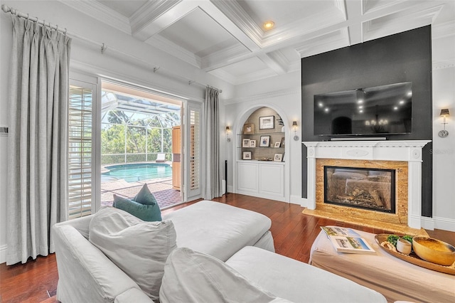 1570 Oakford Rd, Sarasota, FL 34240 - living area with coffered ceiling, hardwood / wood-style floors, crown molding, beam ceiling, and a premium fireplace
