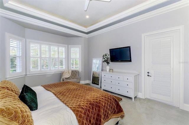 1570 Oakford Rd, Sarasota, FL 34240 - bedroom with ornamental molding, light colored carpet, baseboards, a raised ceiling, and ceiling fan