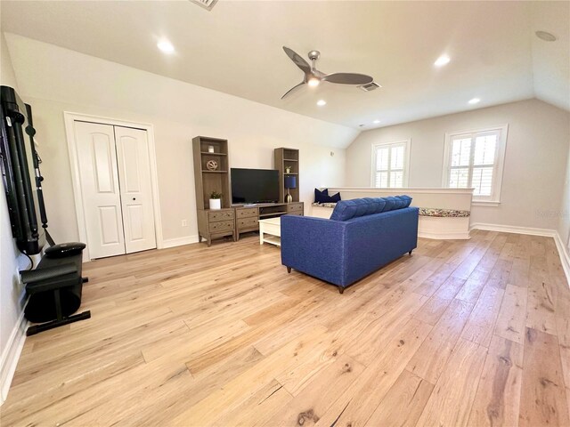 1570 Oakford Rd, Sarasota, FL 34240 - living room with vaulted ceiling, a ceiling fan, light wood-style floors, baseboards, and recessed lighting