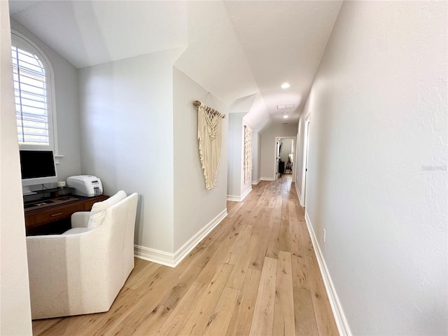 1570 Oakford Rd, Sarasota, FL 34240 - corridor featuring light wood-type flooring, baseboards, and recessed lighting